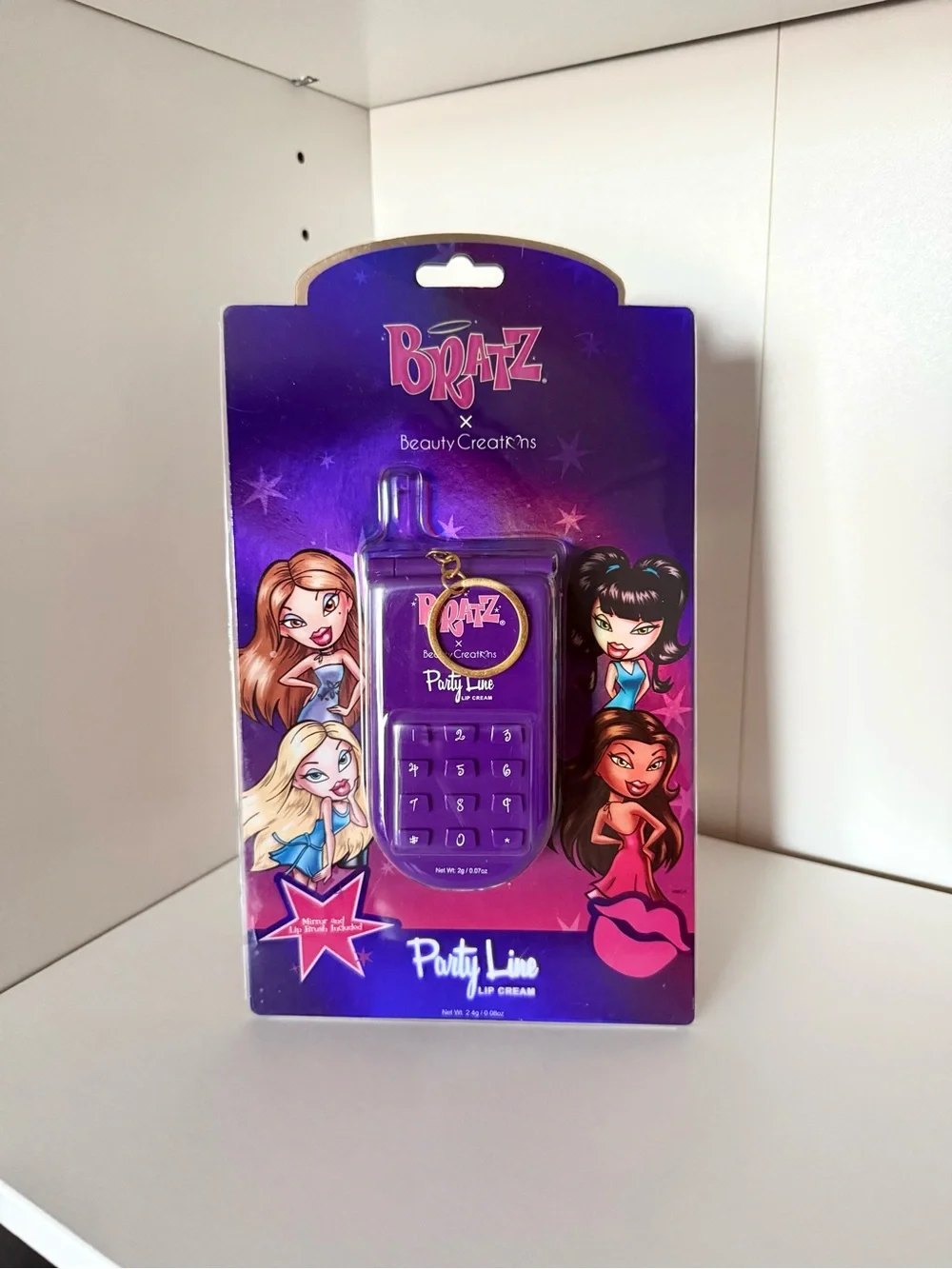 Bratz x Beauty Creations Party Line Lip Cream — Purple Phone-Shaped Balm